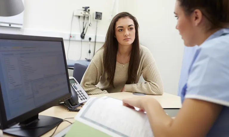Woman attending doctors appointment