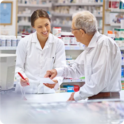 Pharmacist giving providing a prescription