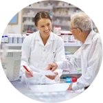 Pharmacist giving providing a prescription